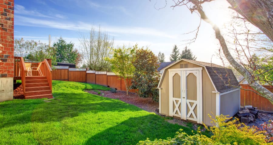 Fenced backyard with storage shed in Columbia